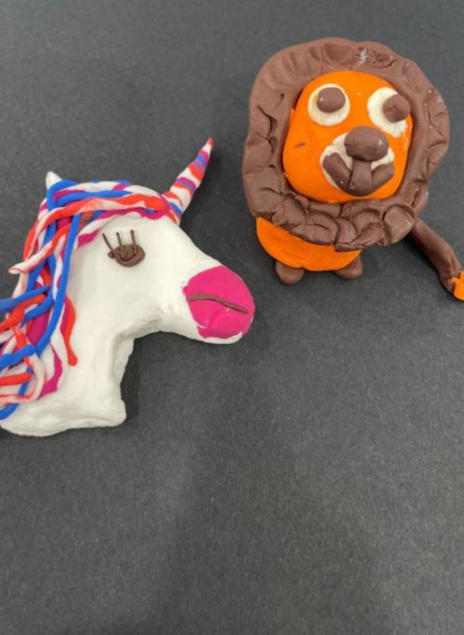 9627c777-91ac-49df-9d81-d26d4e70d87e-lion and unicorn models1.jpg