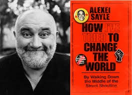 43e2fb04-edb6-4f8b-801e-aaa13bb8618e-alexei  sayle and book.jpg